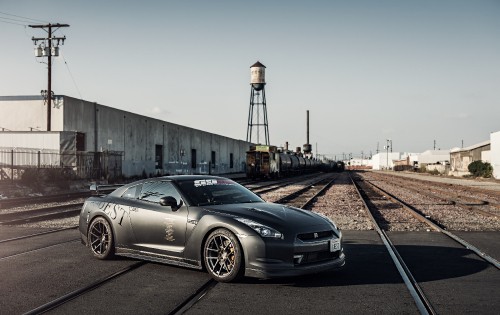 Image black porsche 911 parked on road during daytime