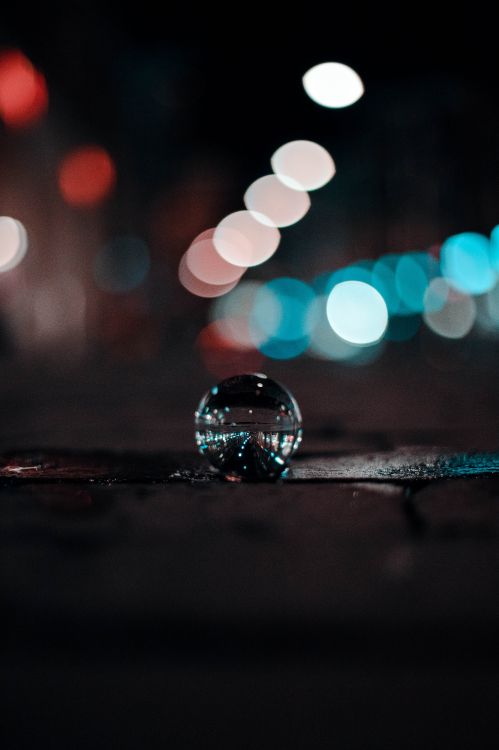 water drop on black surface