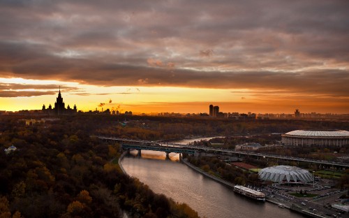 Image aerial view of city during sunset