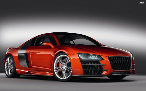 Image red audi coupe in a white room