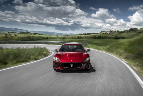 Image red ferrari 458 italia on road during daytime