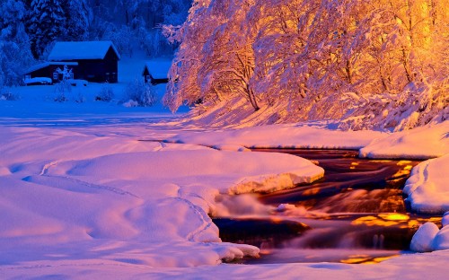 Image brown house on snow covered ground near snow covered mountain during daytime