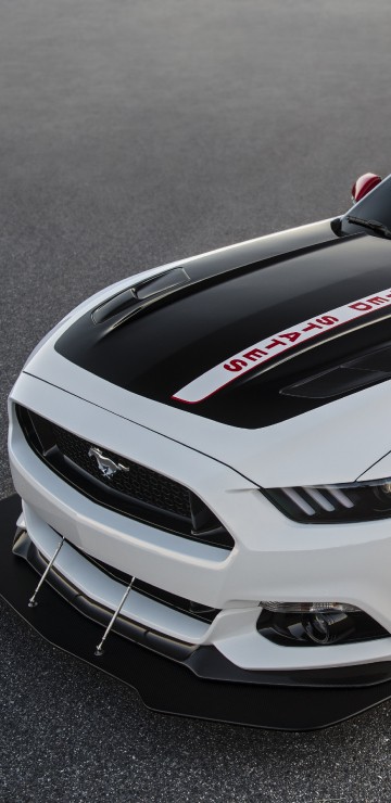 Image white and black porsche 911 on gray asphalt road