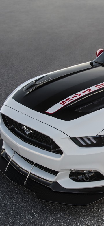 Image white and black porsche 911 on gray asphalt road