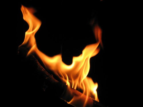 Image orange fire in black background