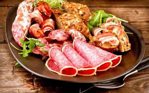 Image raw meat on black plate