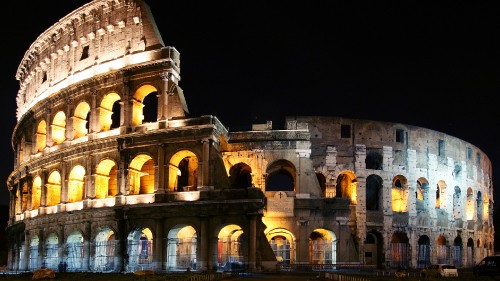 Image brown concrete building during nighttime