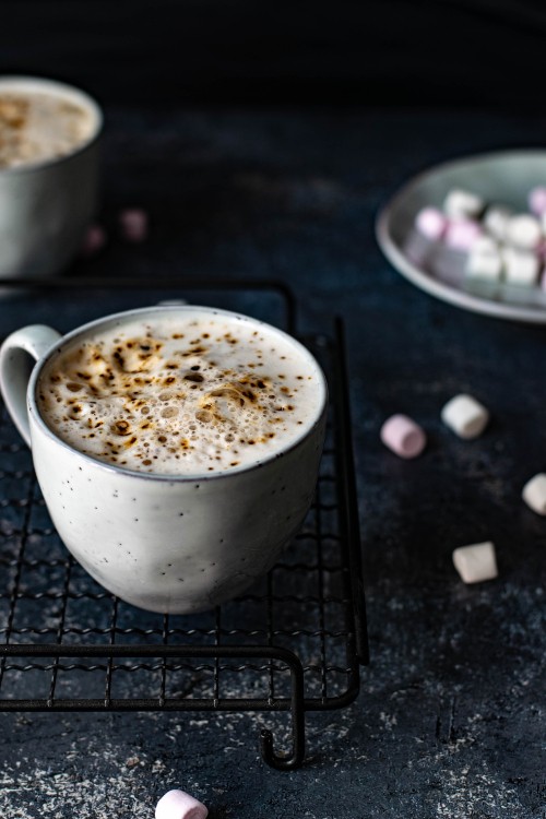 Image white ceramic cup with brown liquid