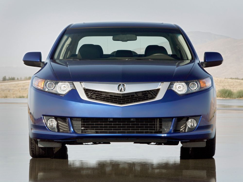 blue mercedes benz car on snow covered ground during daytime