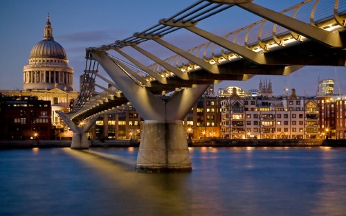 Image bridge over water during night time