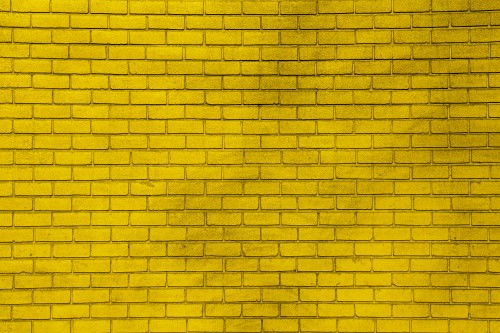 Image yellow and black brick wall