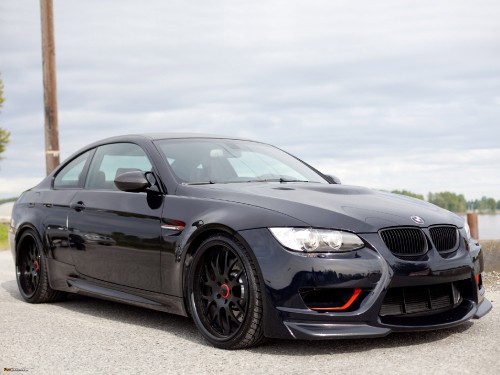 Image black bmw m 3 coupe on gray asphalt road