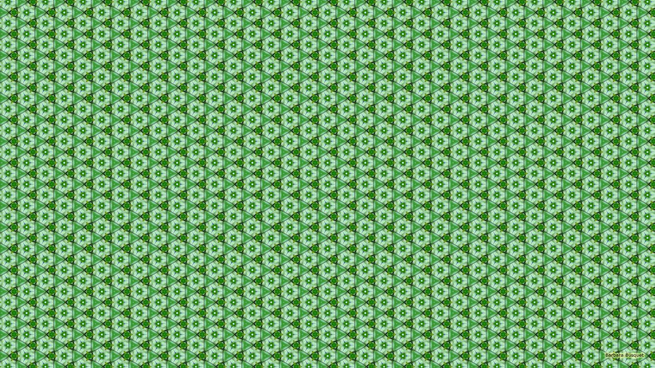 green and white floral textile