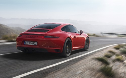 Image red porsche 911 on road during daytime