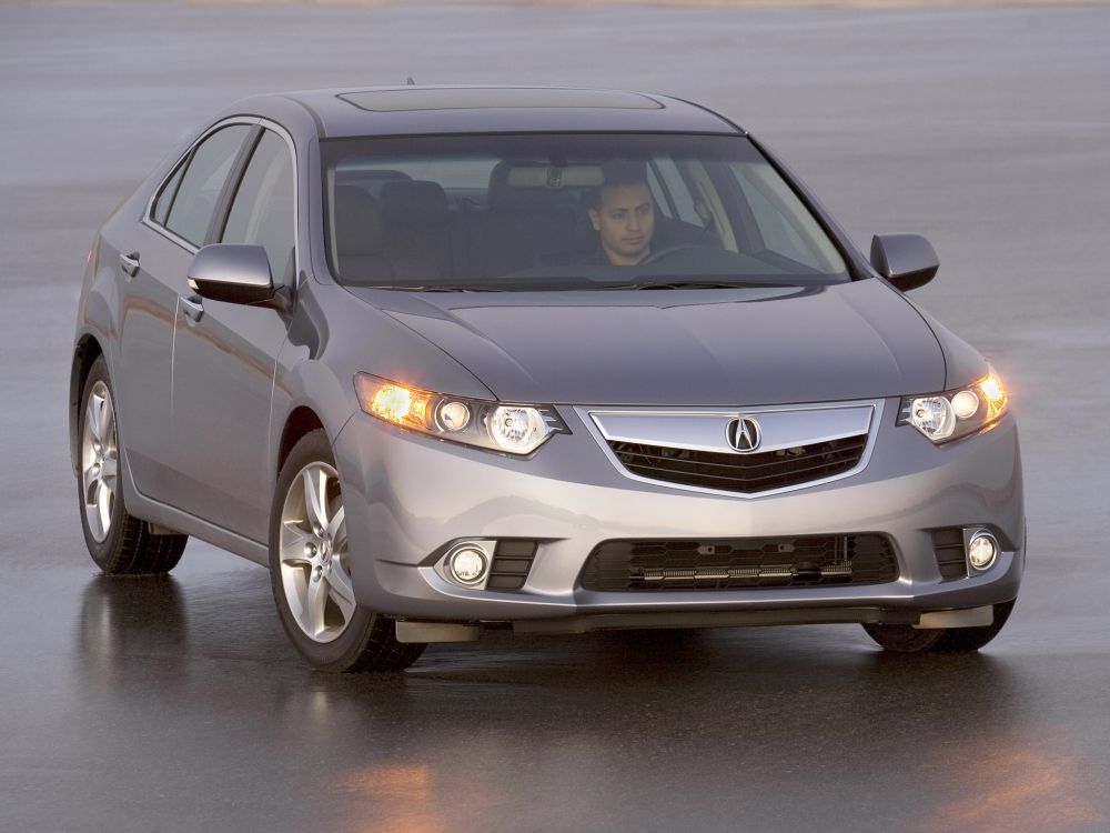 gray honda sedan on gray asphalt road