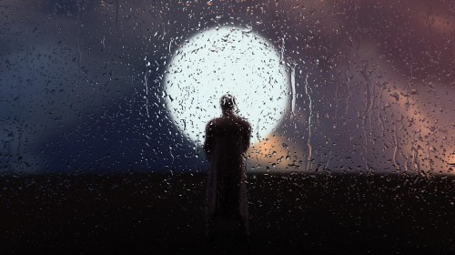 Image silhouette of person standing under blue sky with white stars during nighttime