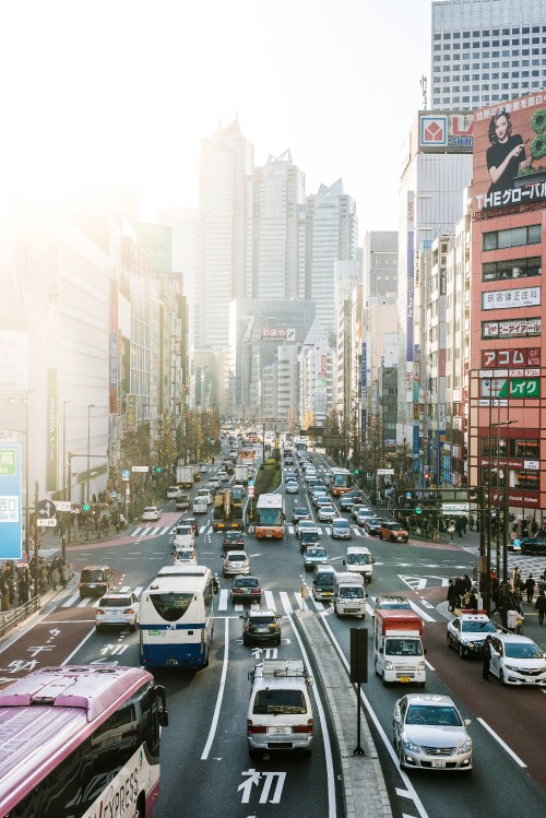 Image cars on road in city during daytime