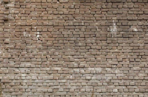 Image brown brick wall during daytime