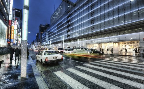 Image white sedan on road near building during daytime