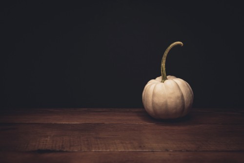 Image pumpkin on brown wooden table