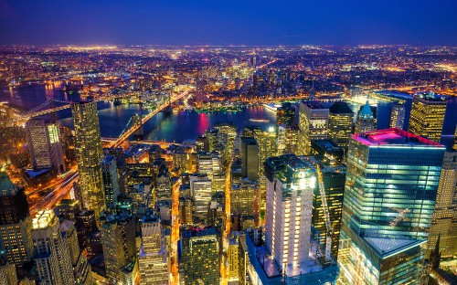 Image aerial view of city buildings during night time