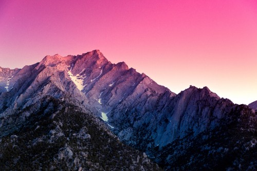 Image brown and gray rocky mountain under blue sky during daytime