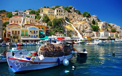 Image white and blue boat on body of water during daytime