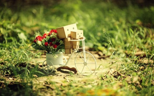 Image white wooden house miniature on brown wooden table