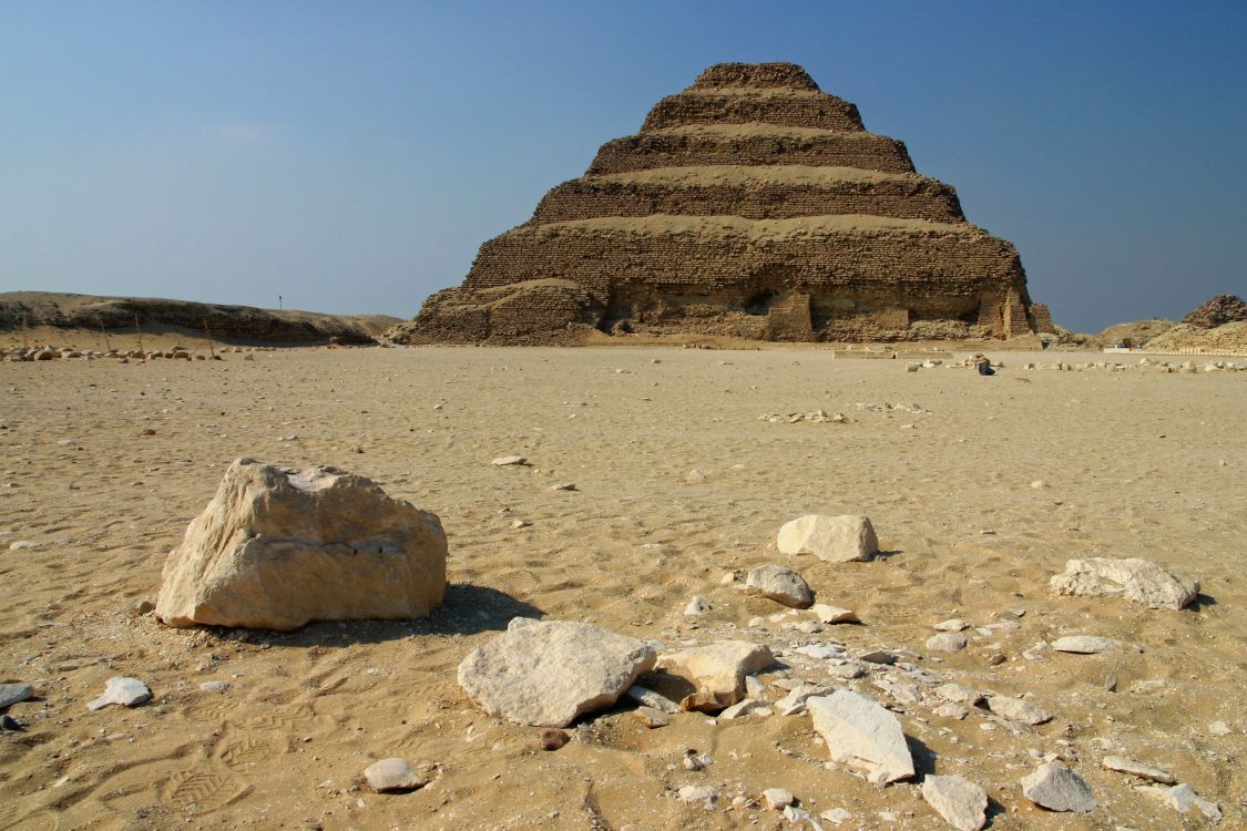 brown rock formation under blue sky during daytime