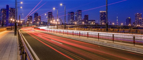 Image time lapse photography of cars on road during night time