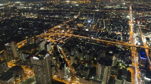 Image aerial view of city buildings during night time