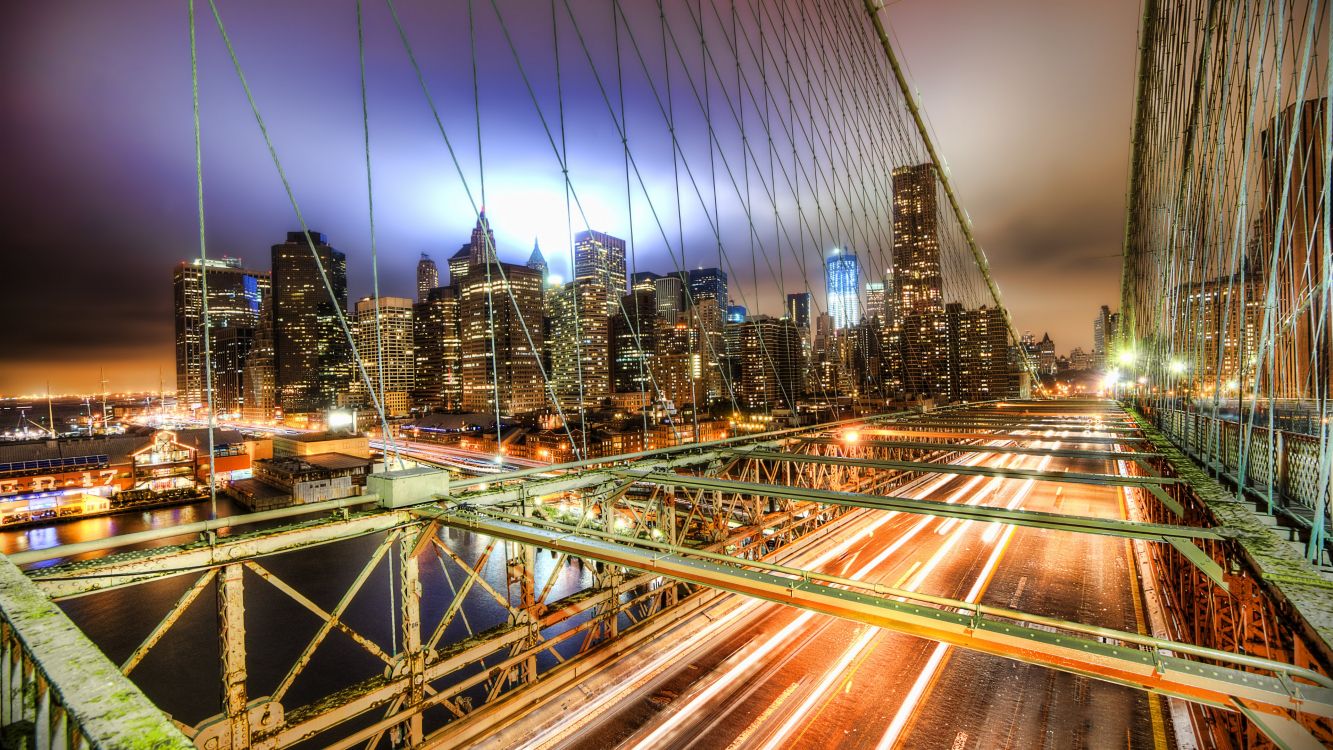 time lapse photography of city lights during night time