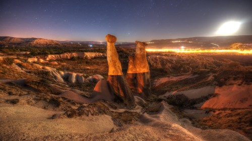 Image brown rock formation during night time