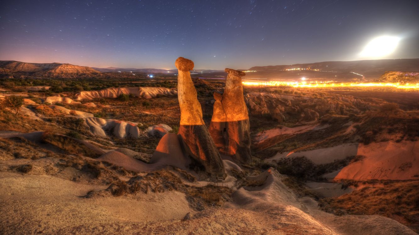 brown rock formation during night time