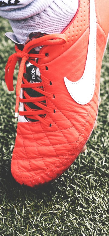 Image red and white nike athletic shoes