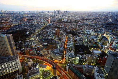 Image aerial view of city buildings during night time