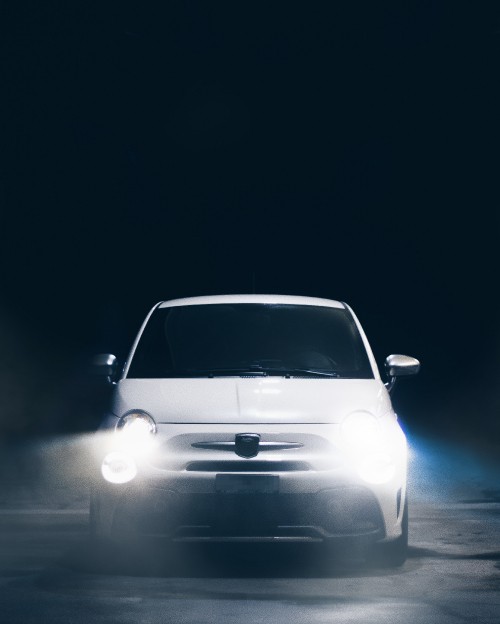 Image white car in a dark room