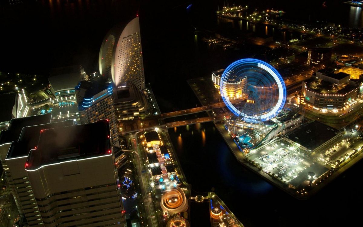 Luftaufnahme Von Stadtgebäuden Während Der Nacht. Wallpaper in 2880x1800 Resolution