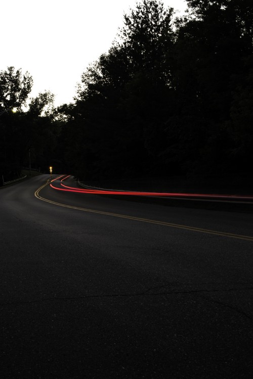 Image time lapse photography of road during night time