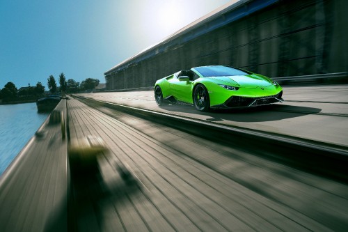 Image green porsche 911 on road during daytime