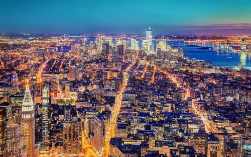 Image aerial view of city buildings during night time