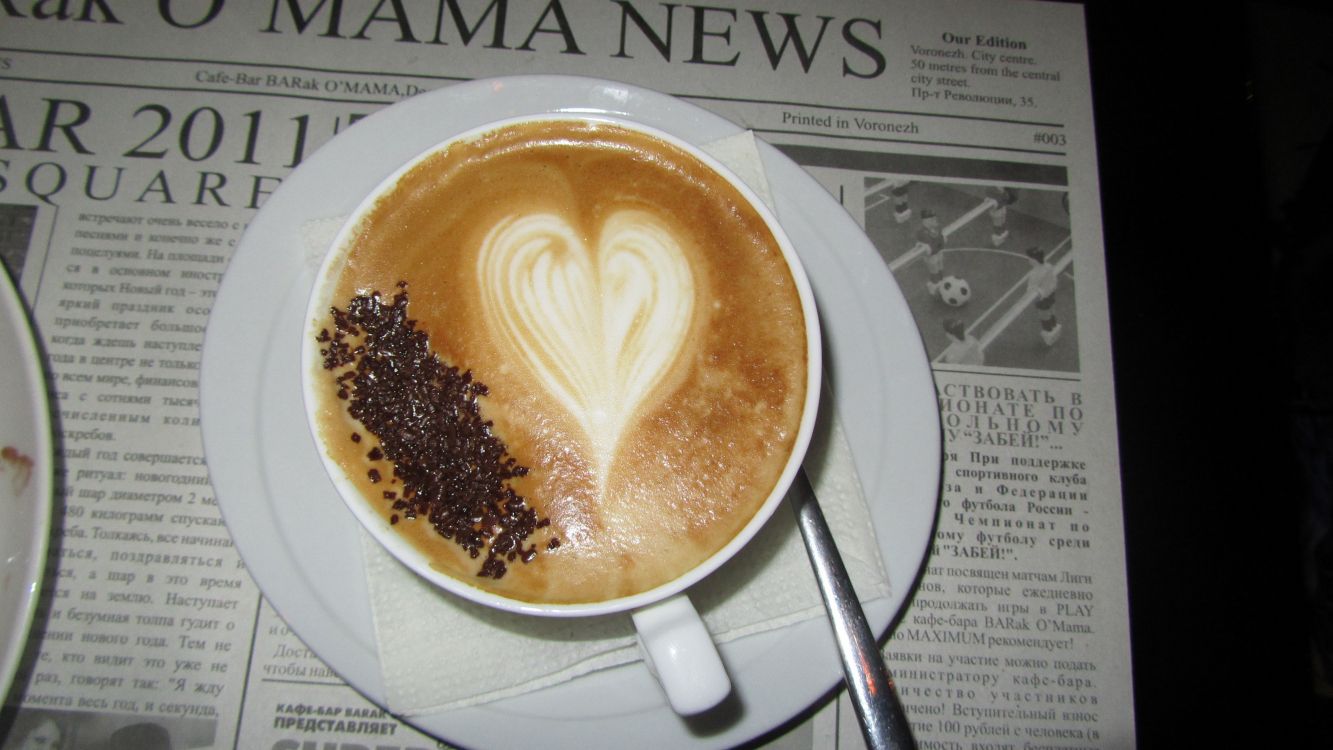 white ceramic mug with coffee