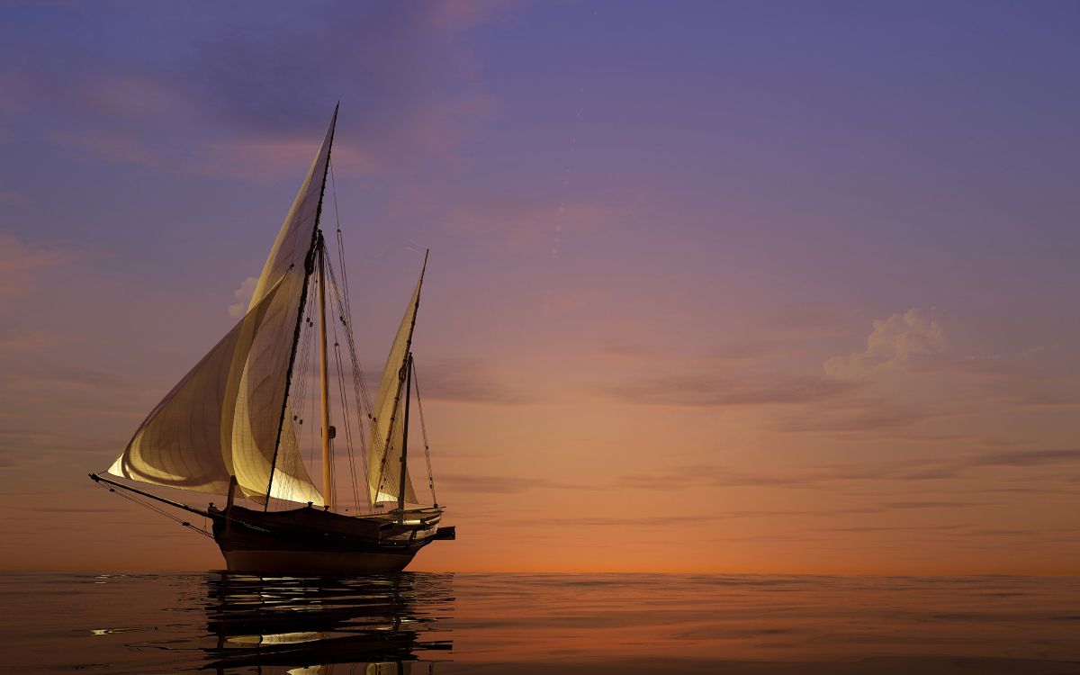 sail boat on body of water during sunset