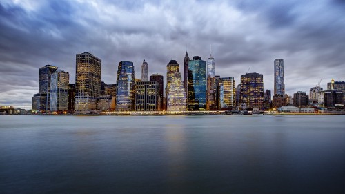 Image city skyline under cloudy sky during daytime