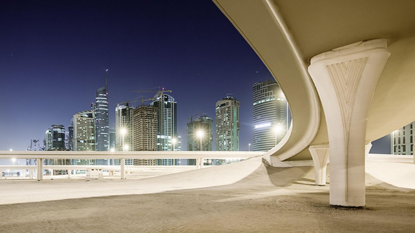 White Concrete Building During Nighttime. Wallpaper in 2913x1635 Resolution