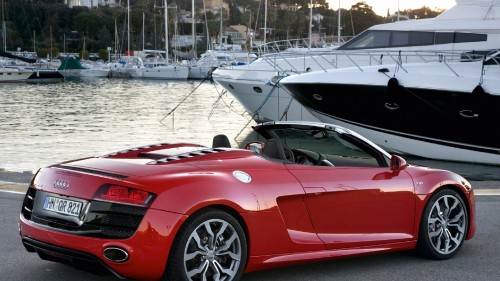 Image red ferrari 458 italia parked on dock during daytime