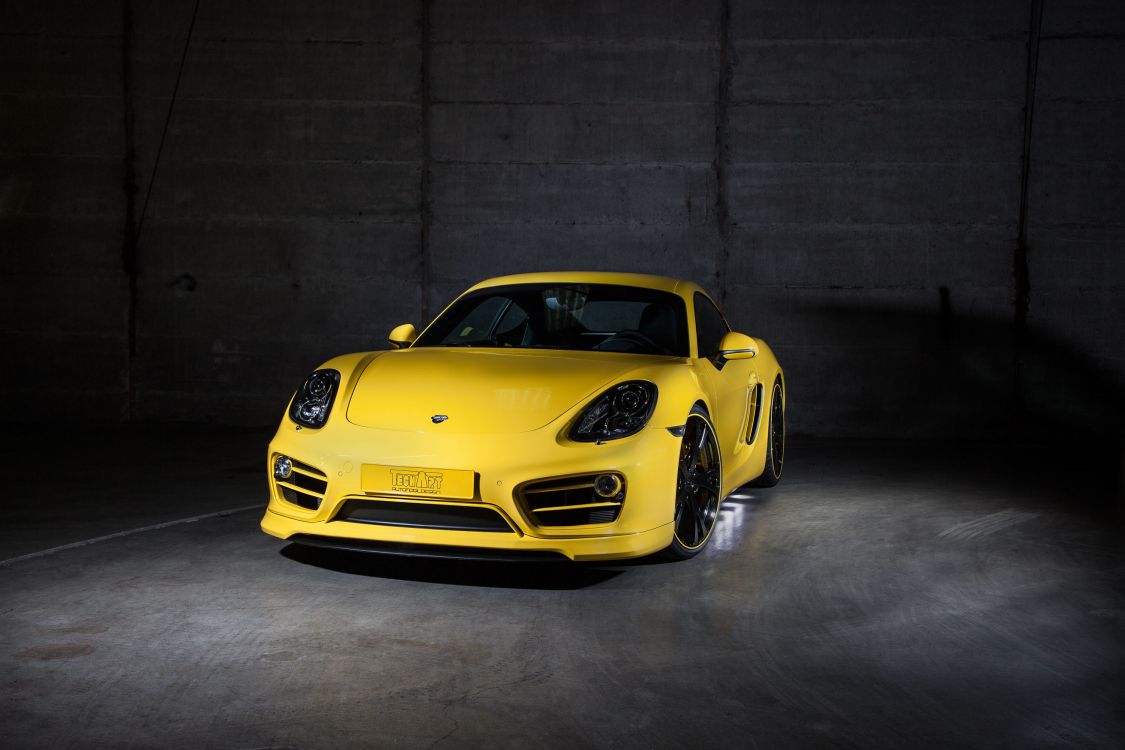 Yellow Porsche 911 Parked in a Garage. Wallpaper in 3000x2000 Resolution