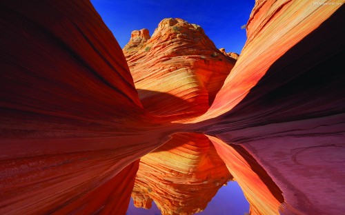 Image brown rock formation under blue sky during daytime