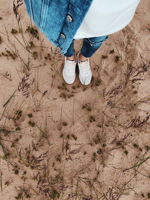 Image soil, grasses, trousers, denim, shoe