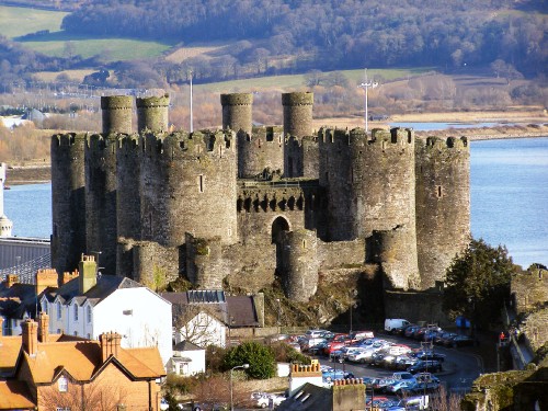 Image brown concrete castle under blue sky during daytime